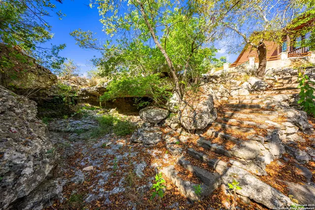 a view of a swimming pool with an ocean view