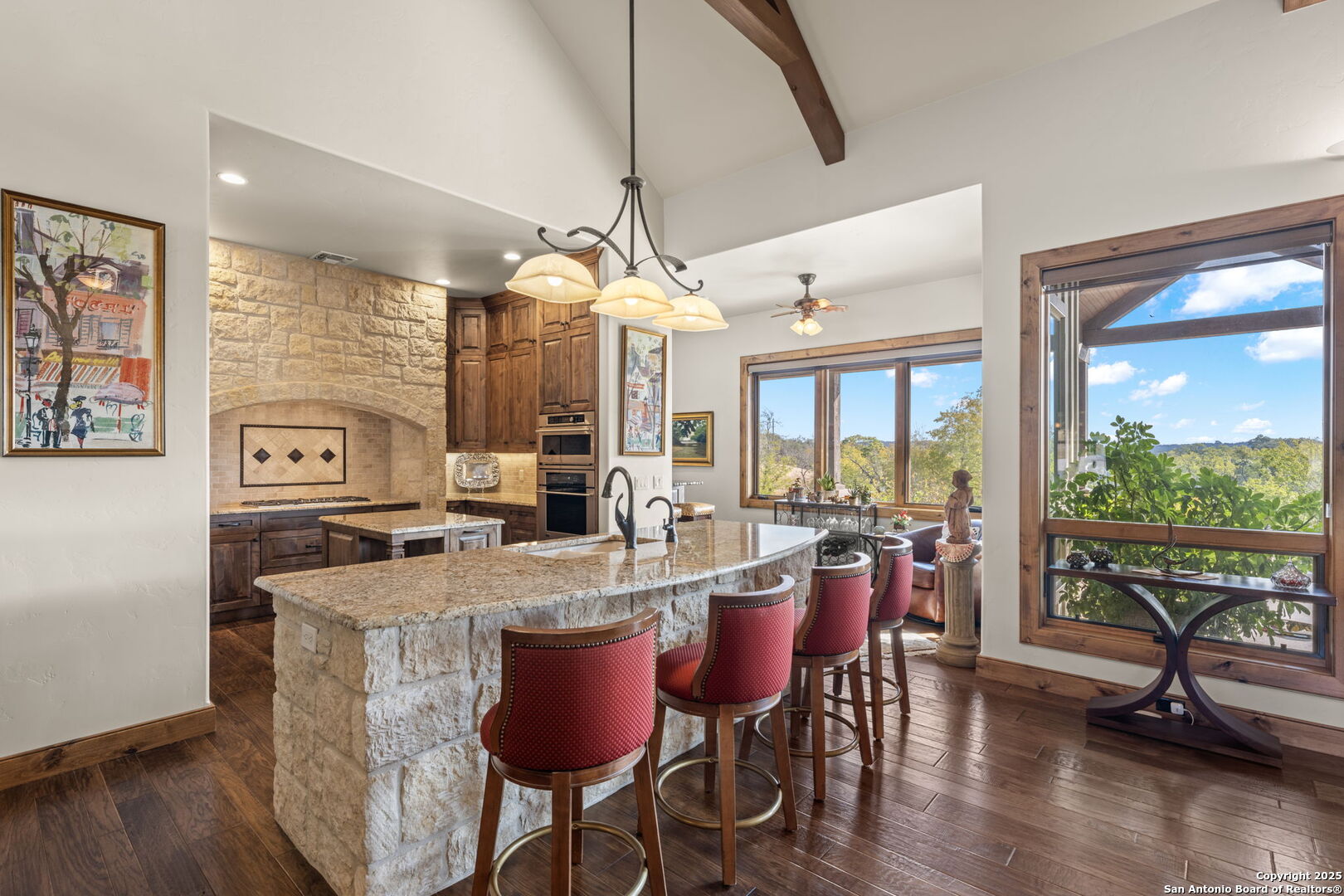 131 Bootlegger Lane North Kerrville, TX 78028 - Photo 5 of 50 a view of a dining room with furniture window and wooden floor