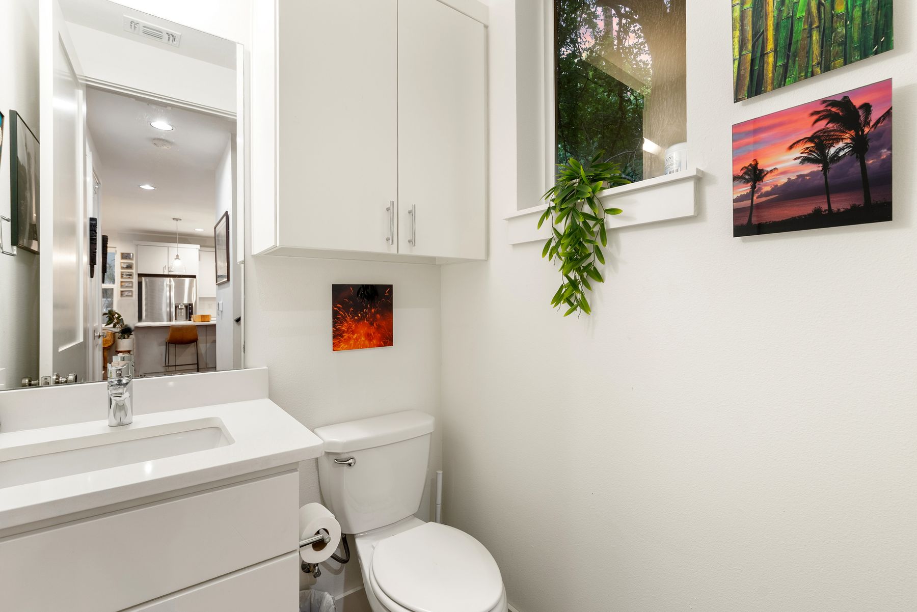1709 Perez Street, Unit 2 Austin, TX 78721 - Photo 21 of 33 A compact and functional bathroom features a sleek vanity and a private commode.
