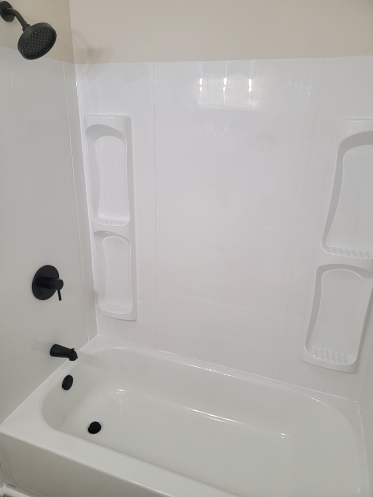 5214 Armour Road Columbus, GA 31904 - Photo 11 of 17 a bathroom with a tub