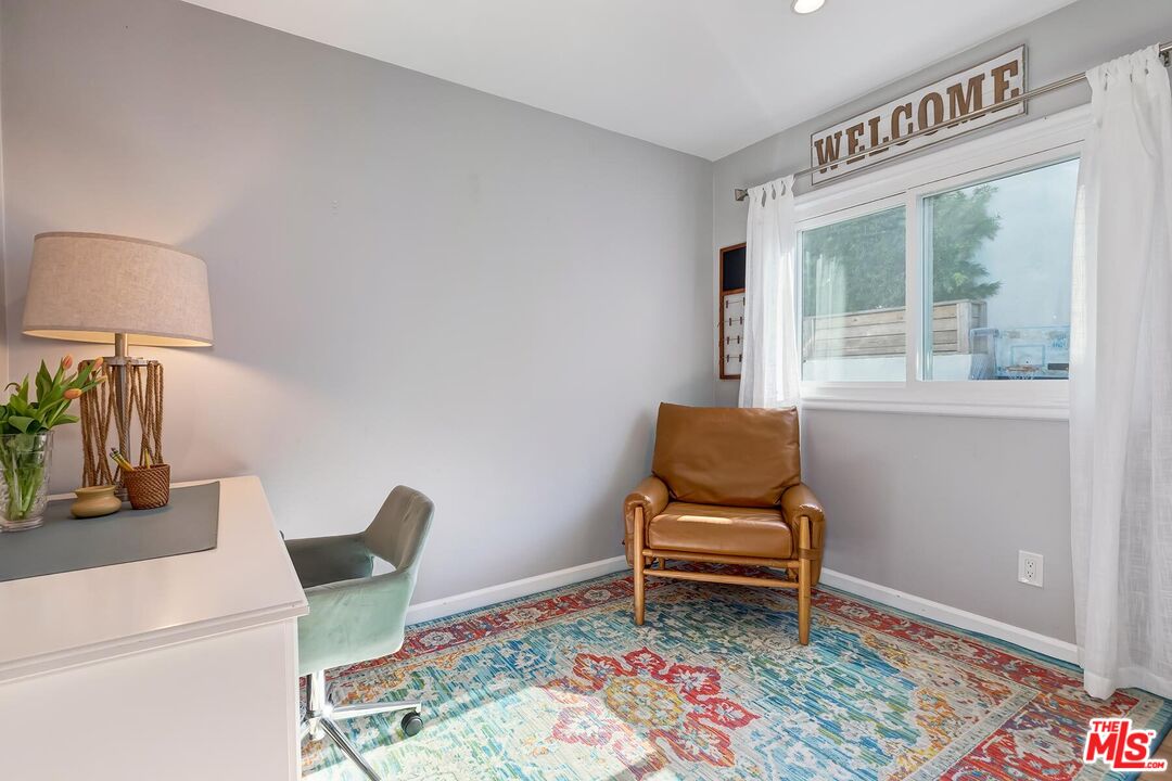434 West Maple Avenue El Segundo, CA 90245 - Photo 22 of 29 a living room with a couch and a window
