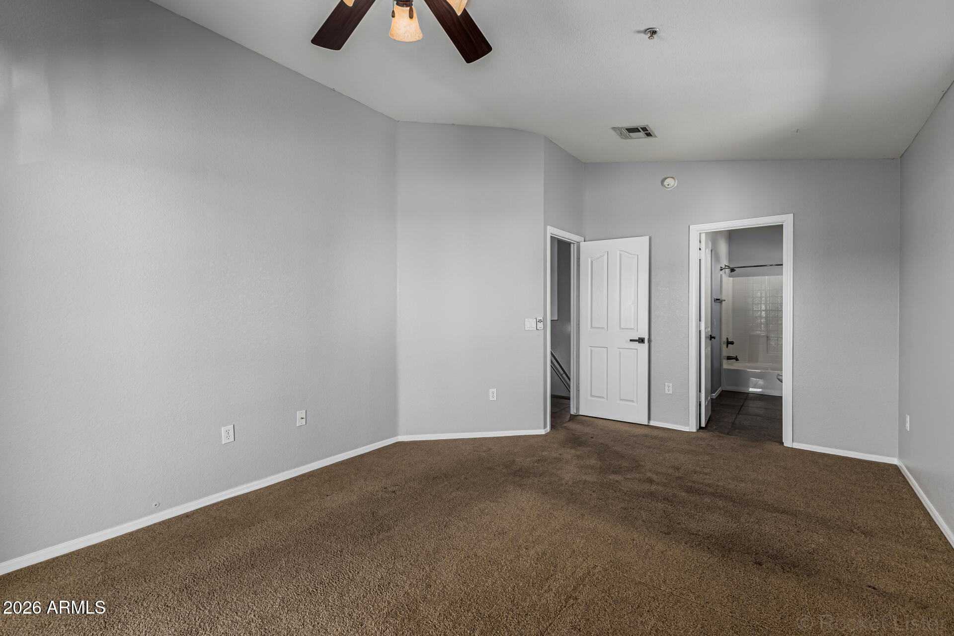 462 North 168th Lane Goodyear, AZ 85338 - Photo 11 of 32 a view of an empty room