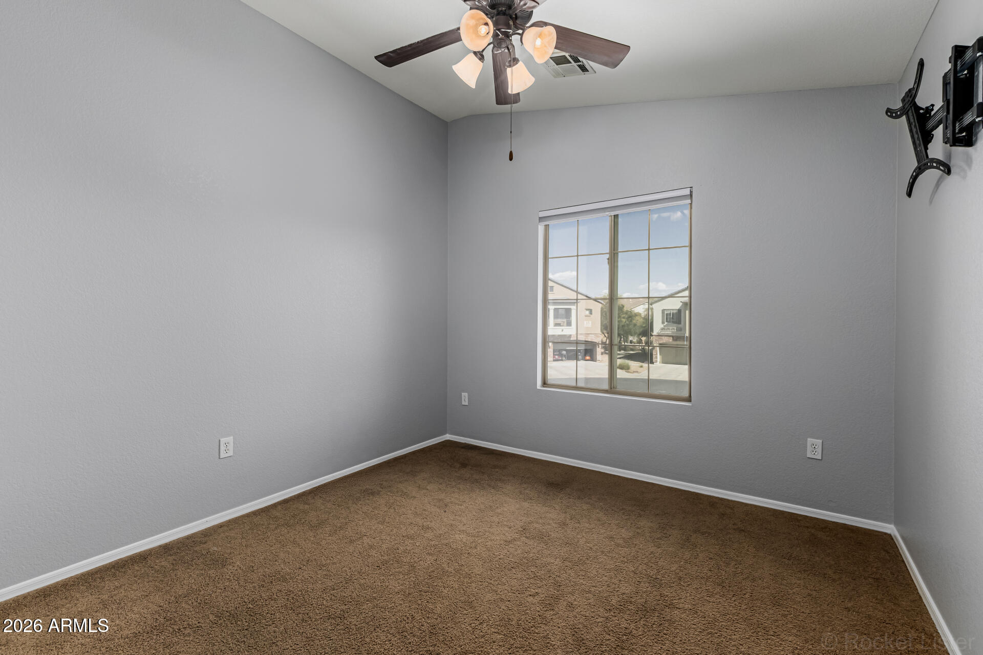 462 North 168th Lane Goodyear, AZ 85338 - Photo 14 of 32 an empty room with a window