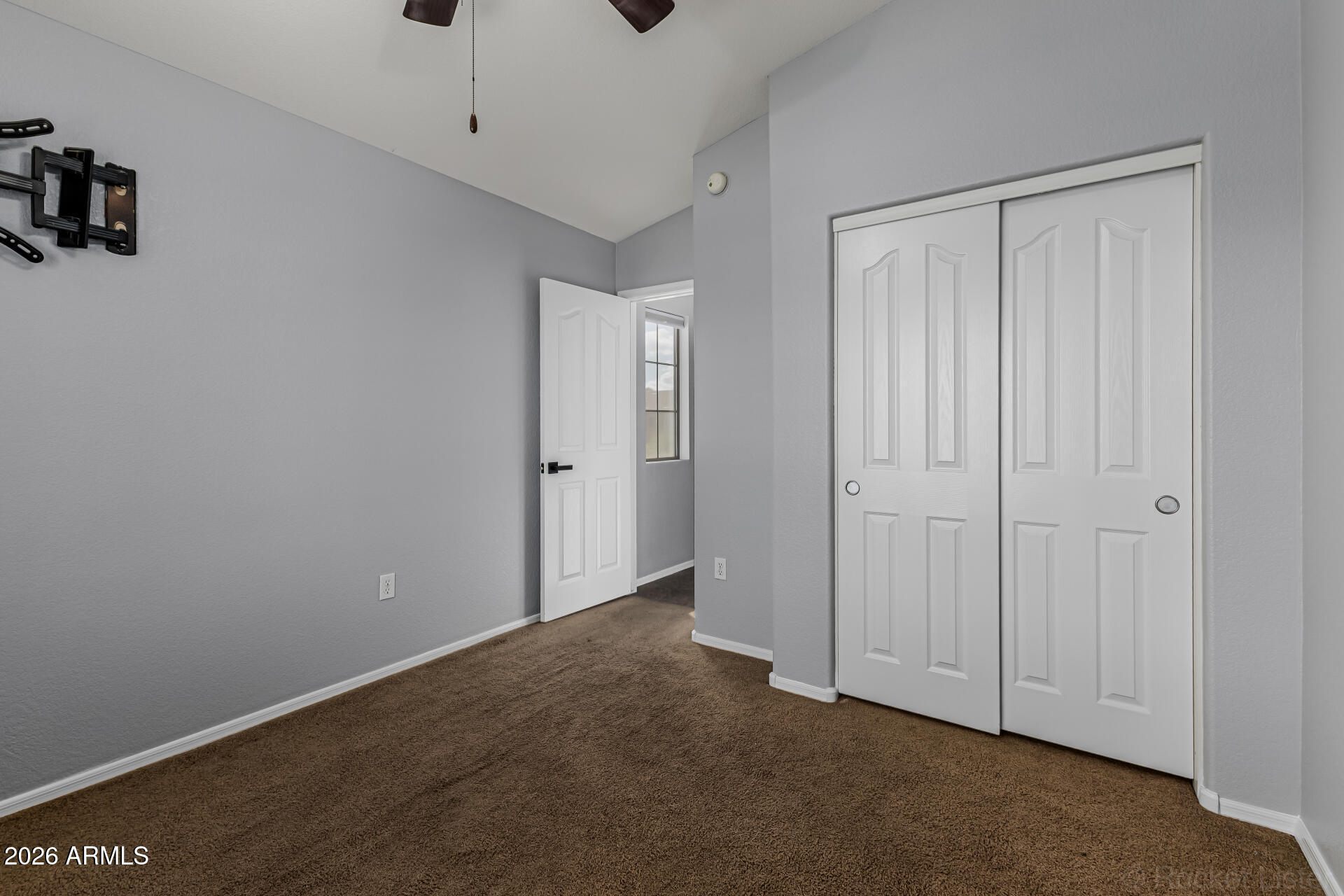 462 North 168th Lane Goodyear, AZ 85338 - Photo 15 of 32 a view of an empty room