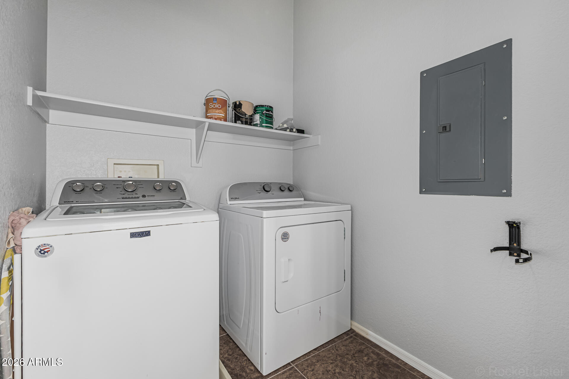 462 North 168th Lane Goodyear, AZ 85338 - Photo 17 of 32 a utility room with dryer and washer