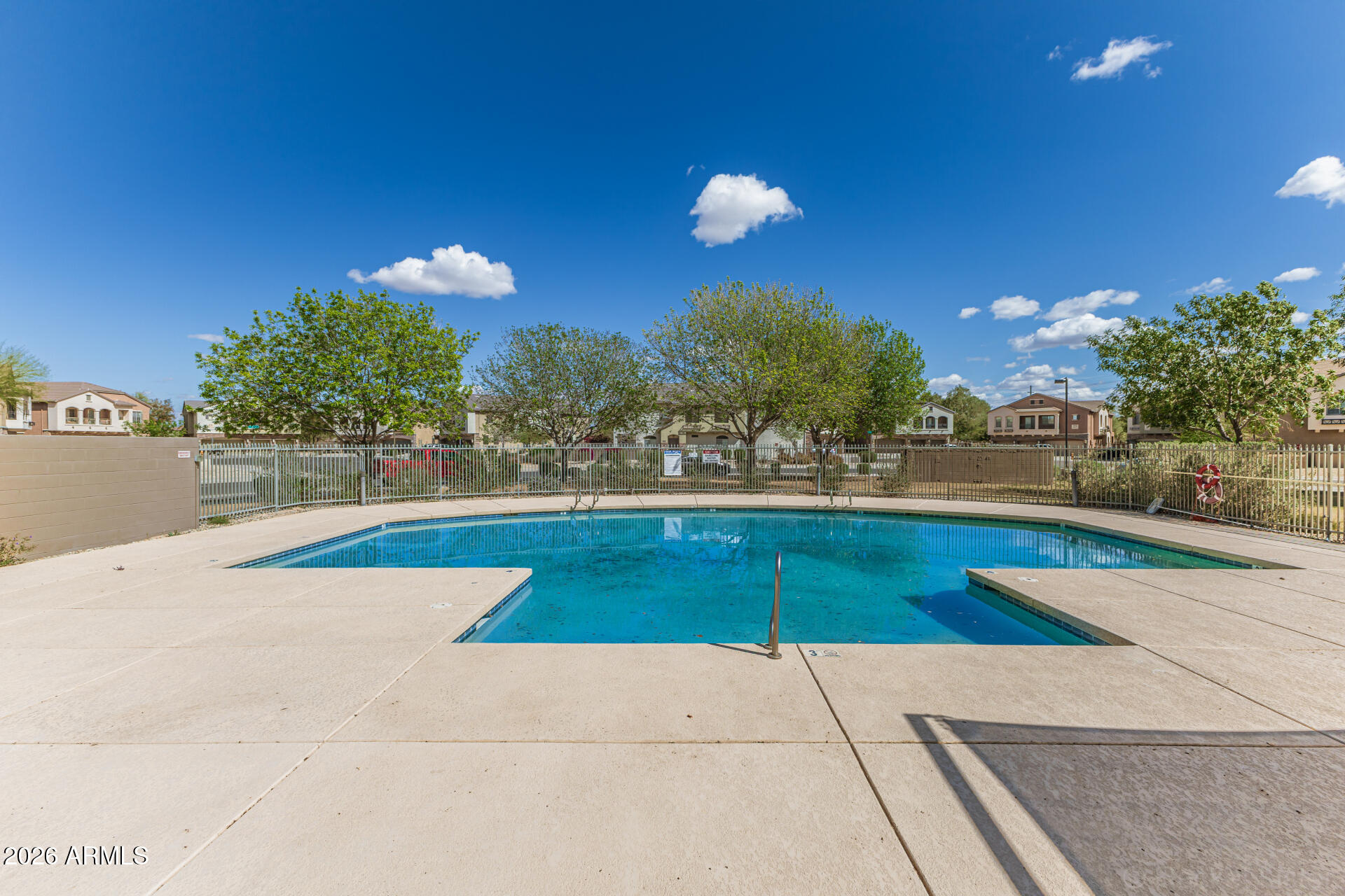 462 North 168th Lane Goodyear, AZ 85338 - Photo 27 of 32 a view of outdoor space yard and swimming pool