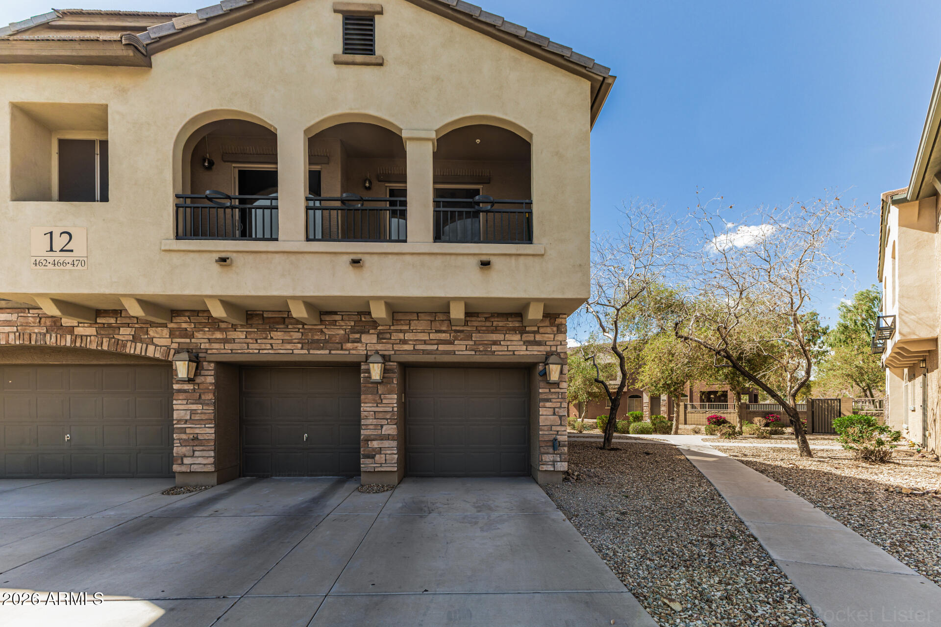 462 North 168th Lane Goodyear, AZ 85338 - Photo 30 of 32 a front view of a house
