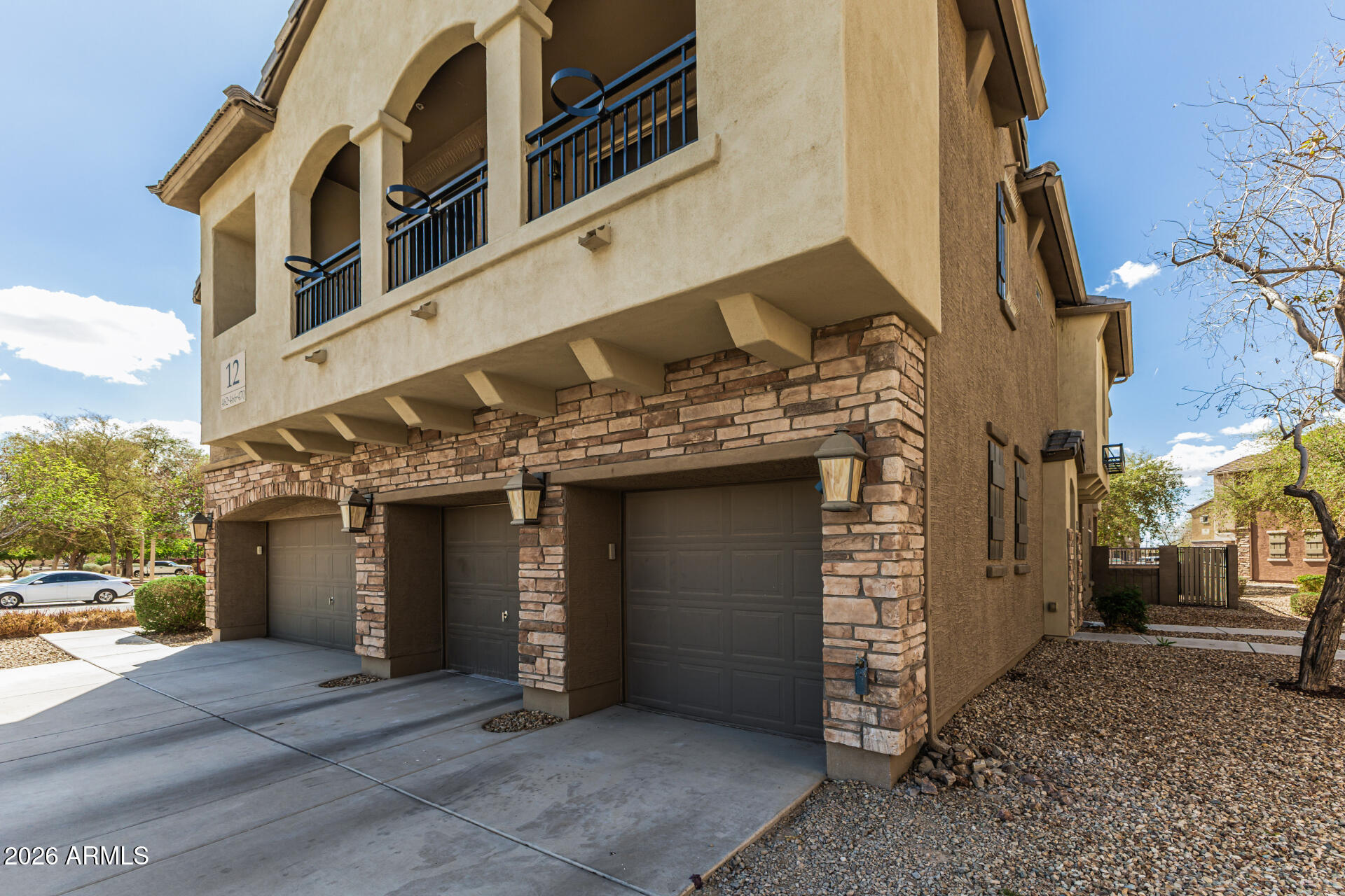462 North 168th Lane Goodyear, AZ 85338 - Photo 32 of 32 a front view of a building with parking space