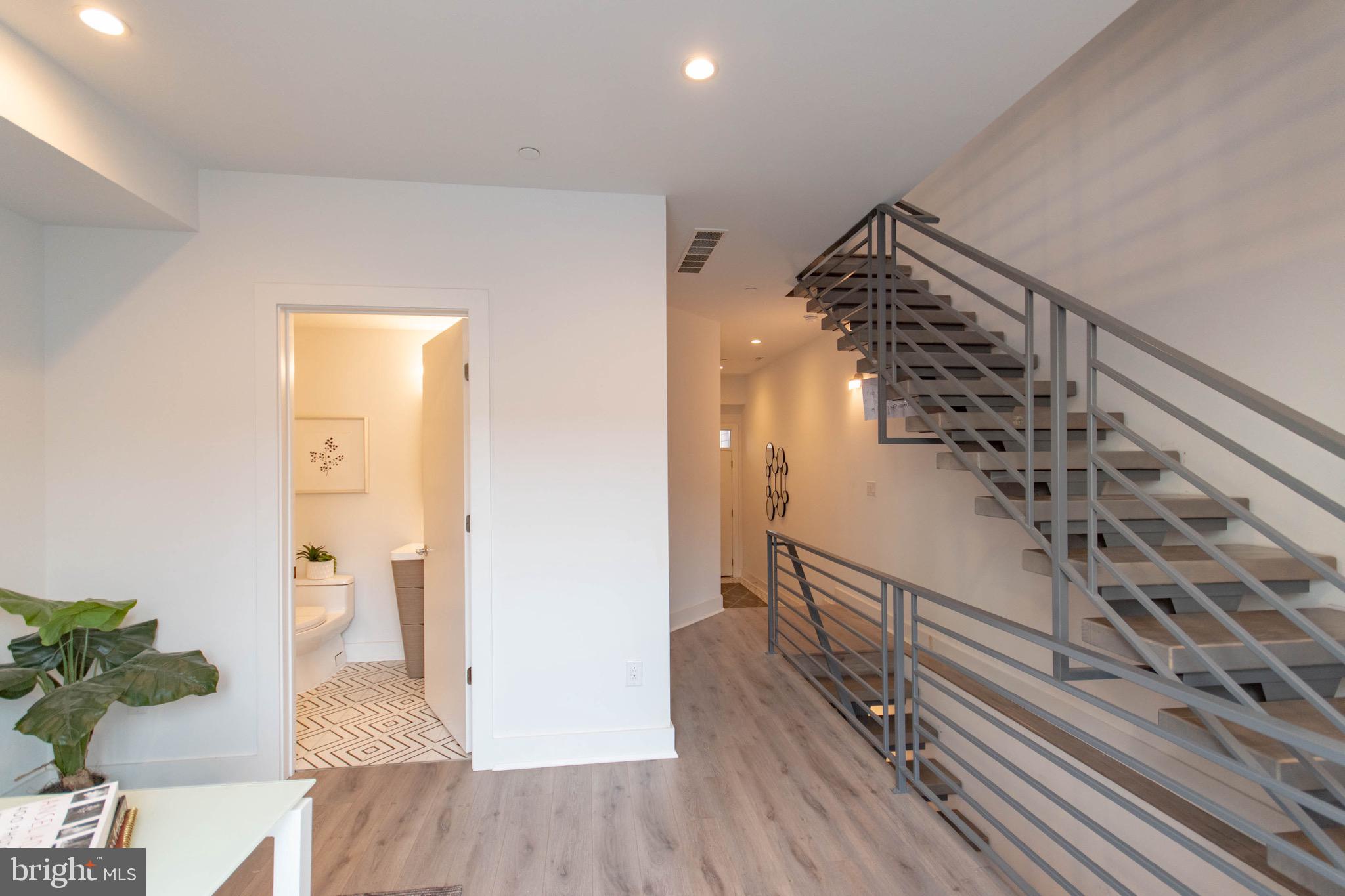 105 Olive Street Philadelphia, PA 19123 - Photo 4 of 36 a view of entryway with wooden floor