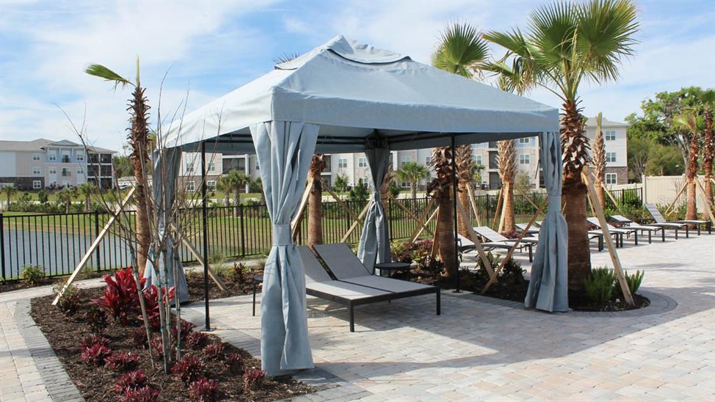 4281 Southwest 52nd Lane Road Ocala, FL 34474 - Photo 15 of 24 a building outdoor space with seating space
