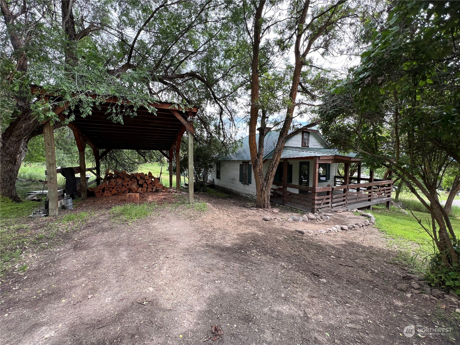 50 Klondike Road Republic, WA 99166 - Photo 15 of 18 a front view of a house with garden