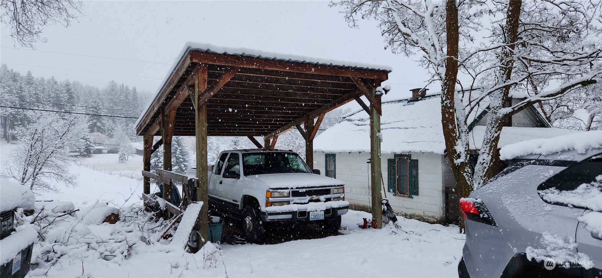 50 Klondike Road Republic, WA 99166 - Photo 16 of 18 a car parked in front of house