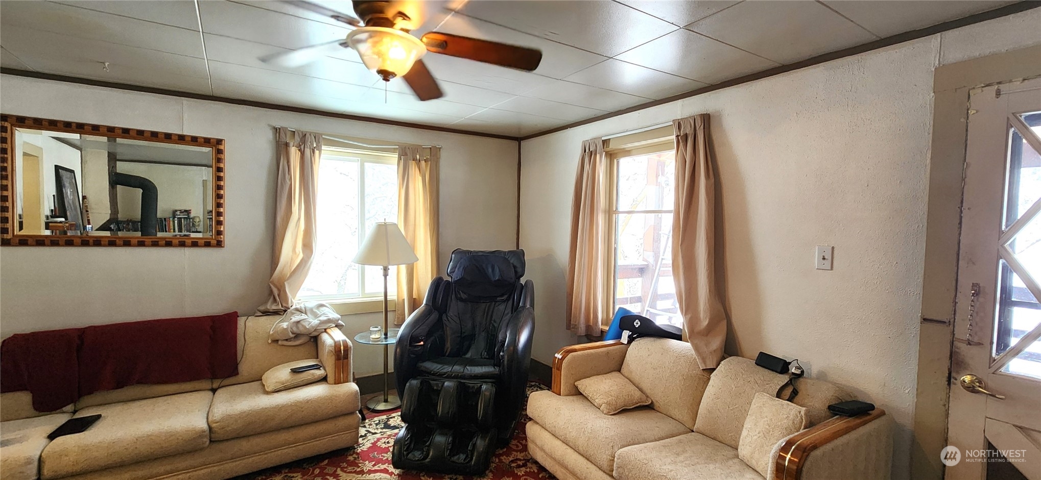 50 Klondike Road Republic, WA 99166 - Photo 3 of 18 a living room with furniture and a window
