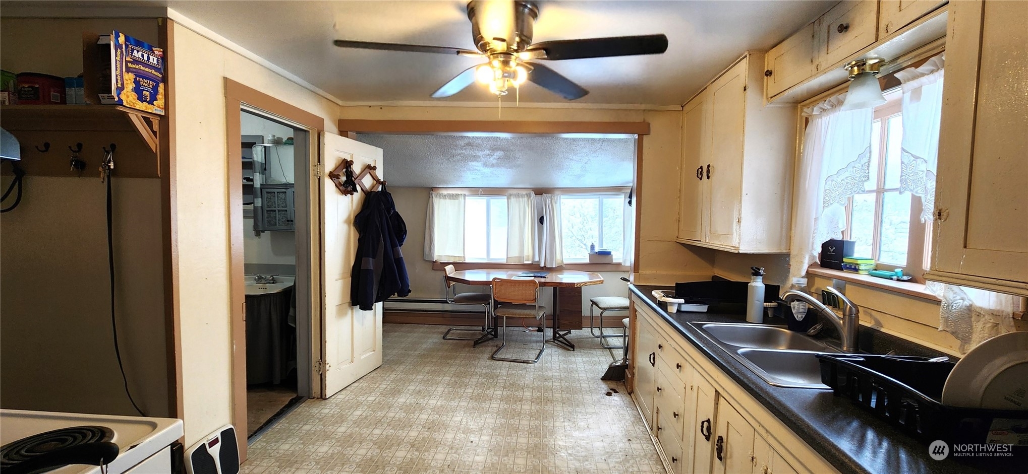 50 Klondike Road Republic, WA 99166 - Photo 7 of 18 a kitchen with a refrigerator and a sink
