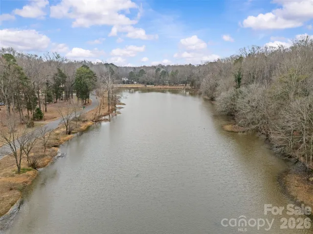a view of a lake with mountain