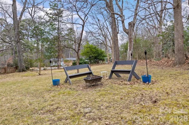 a view of a field with trees