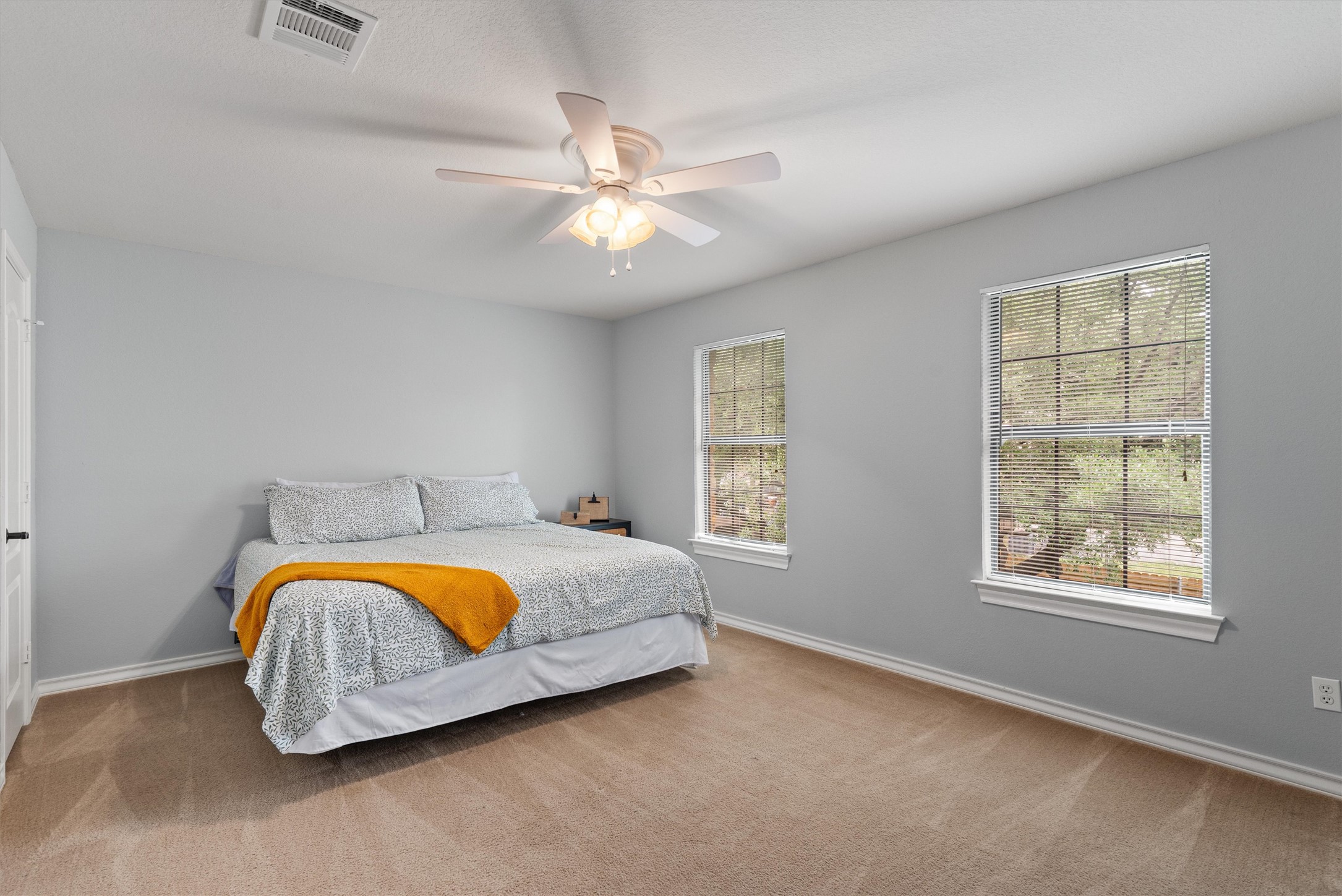 101 Breakaway Road Cedar Park, TX 78613 - Photo 30 of 37 Bedroom with carpet floors and a ceiling fan