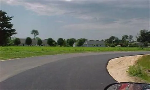 a view of a golf course with a park