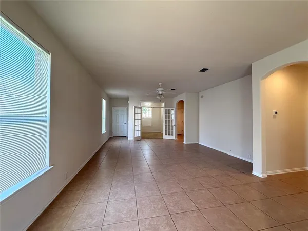 a view of hallway with a window