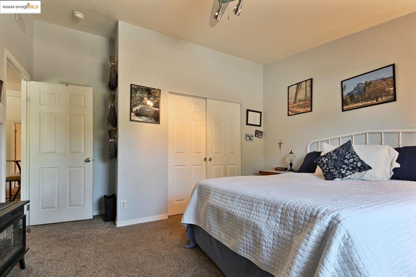 3770 Sheep Ranch Road Murphys, CA 95247 - Photo 12 of 60 a bedroom with a bed and a window