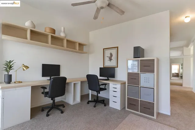 a bed room with a bed and a chair