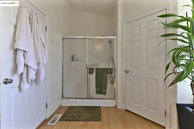 a view of a town with swimming pool and seating area