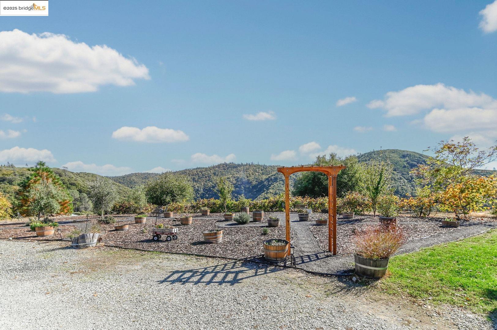 3770 Sheep Ranch Road Murphys, CA 95247 - Photo 33 of 60 a view of a town with swimming pool and seating area