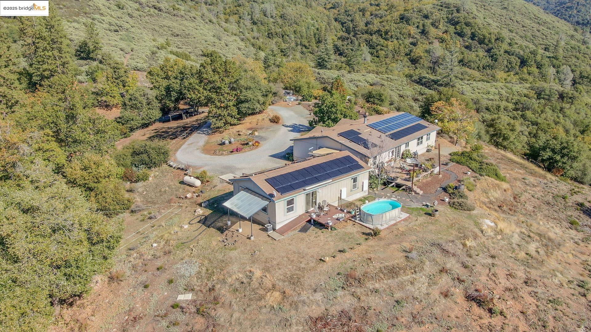 3770 Sheep Ranch Road Murphys, CA 95247 - Photo 54 of 60 an aerial view of a house with yard and outdoor seating