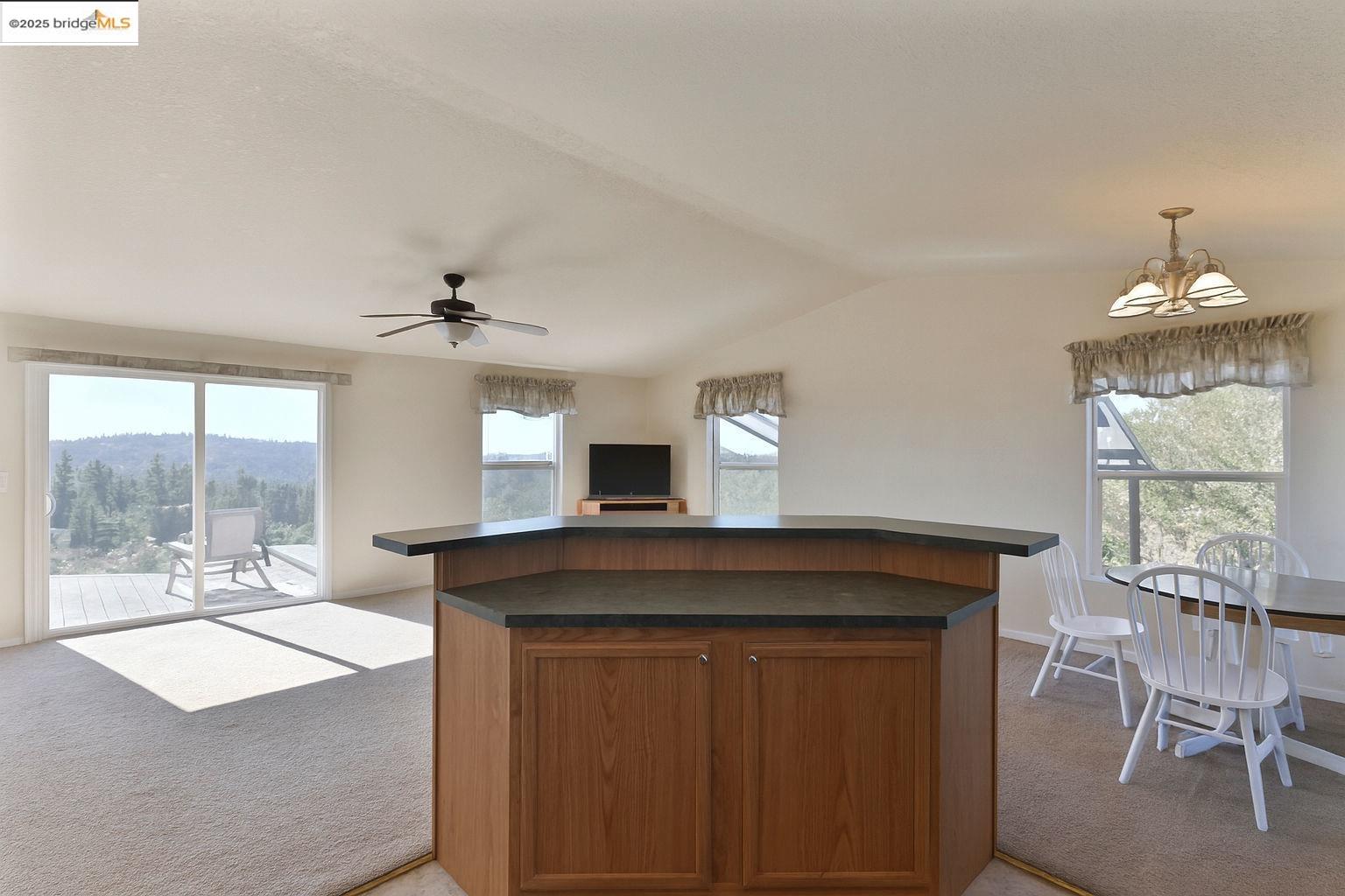 3770 Sheep Ranch Road Murphys, CA 95247 - Photo 60 of 60 a kitchen with a table and chairs