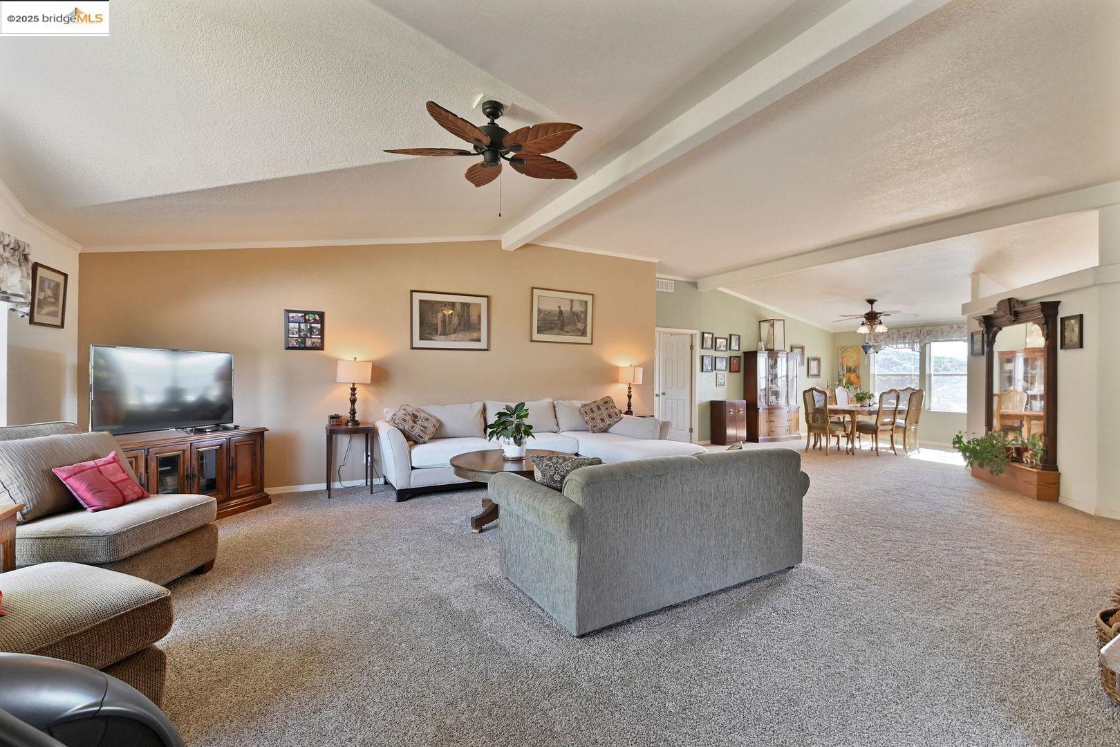 3770 Sheep Ranch Road Murphys, CA 95247 - Photo 8 of 60 a living room with furniture and a flat screen tv