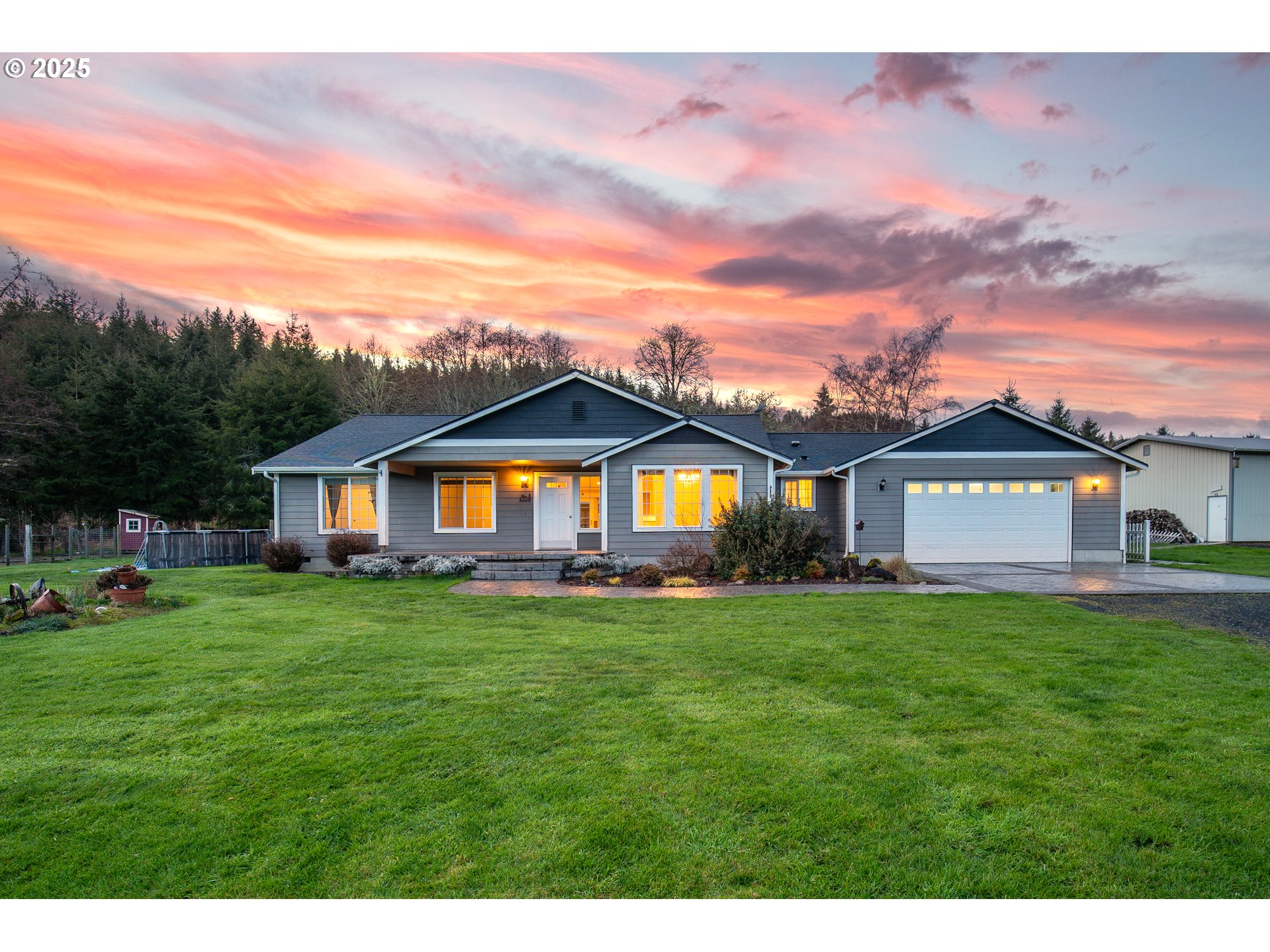 23 Elk Ridge Drive Cathlamet, WA 98612 - Photo 1 of 46 a front view of a house with a yard