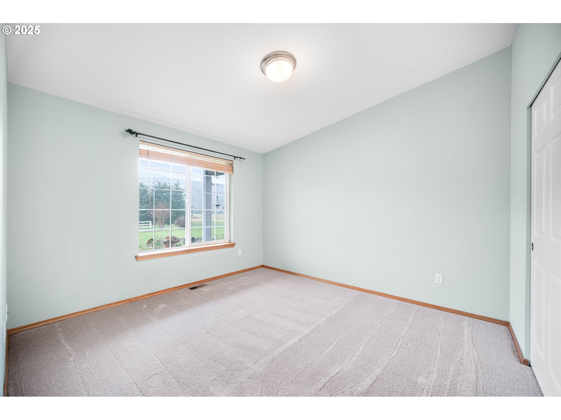 23 Elk Ridge Drive Cathlamet, WA 98612 - Photo 20 of 46 a view of an empty room with a window
