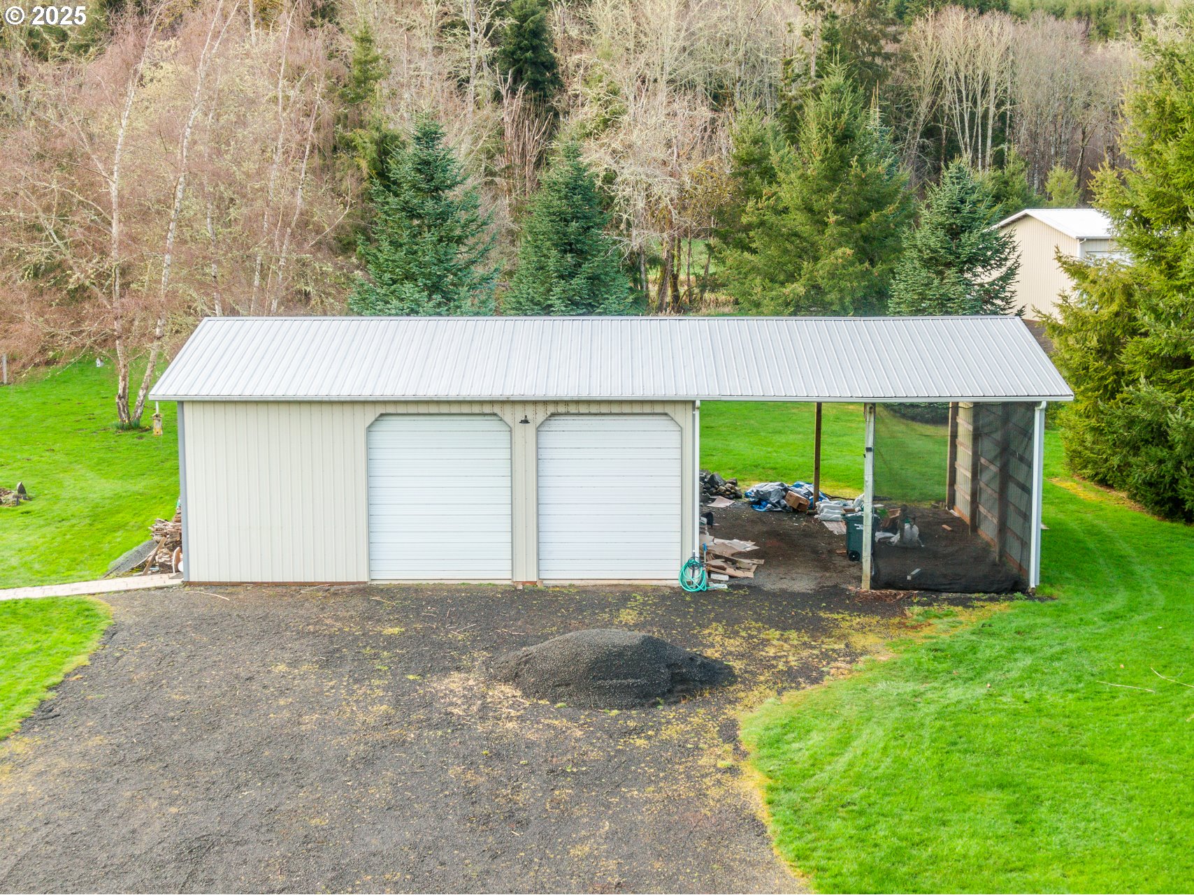 23 Elk Ridge Drive Cathlamet, WA 98612 - Photo 26 of 46 a view of a house with a patio and a yard