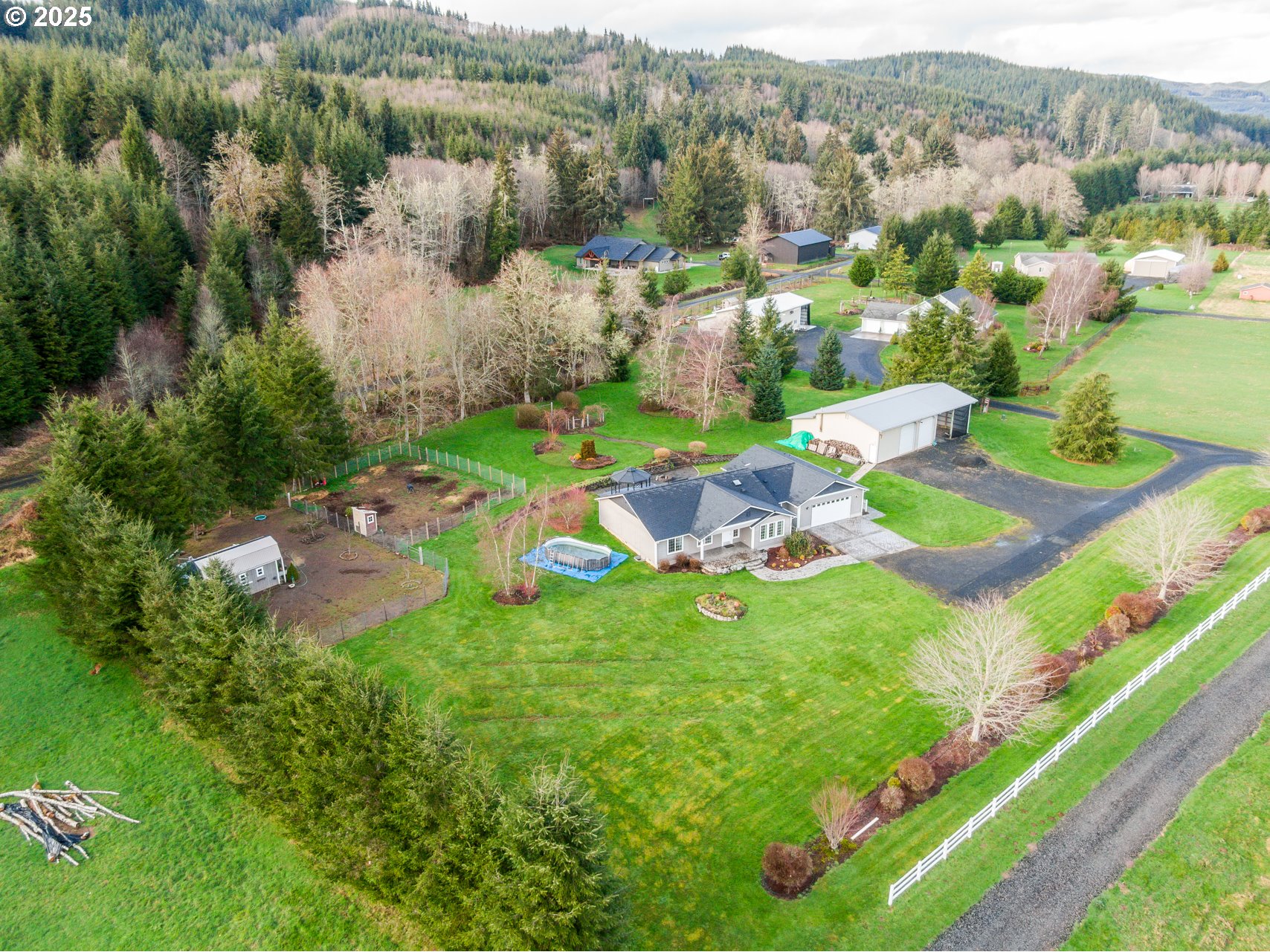 23 Elk Ridge Drive Cathlamet, WA 98612 - Photo 33 of 46 an aerial view of a residential houses with outdoor space and street view