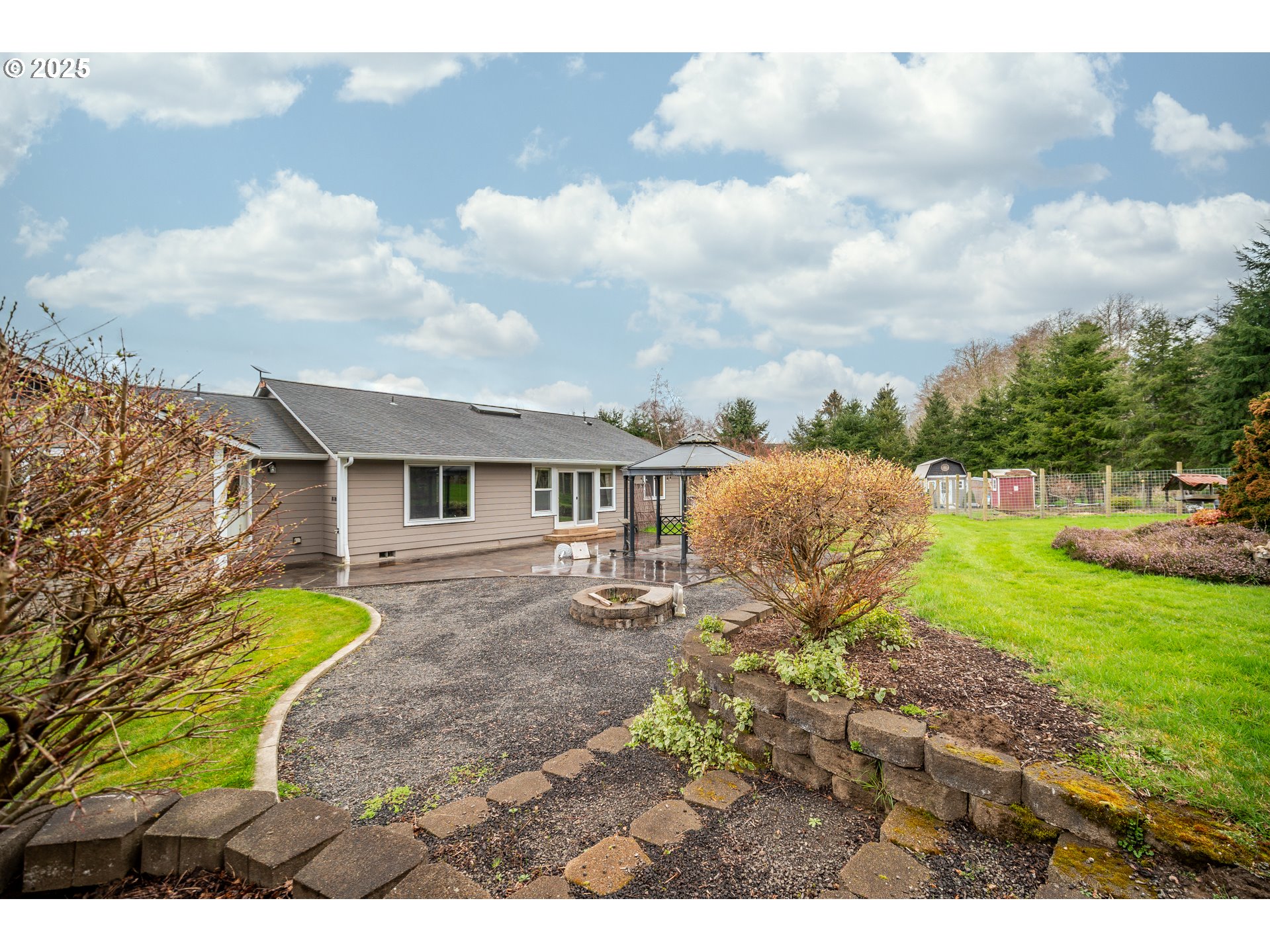 23 Elk Ridge Drive Cathlamet, WA 98612 - Photo 38 of 46 a view of a house with backyard and sitting area