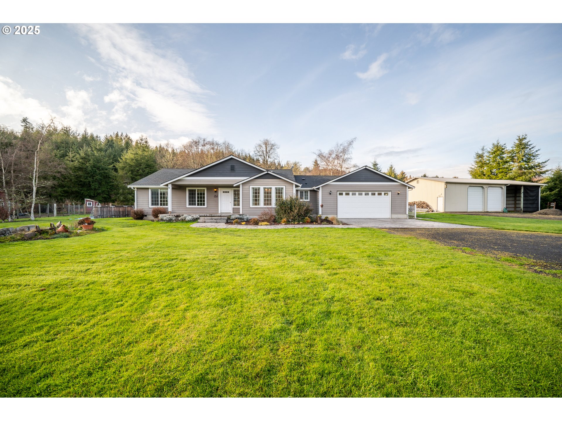 23 Elk Ridge Drive Cathlamet, WA 98612 - Photo 42 of 46 a house view with a garden space
