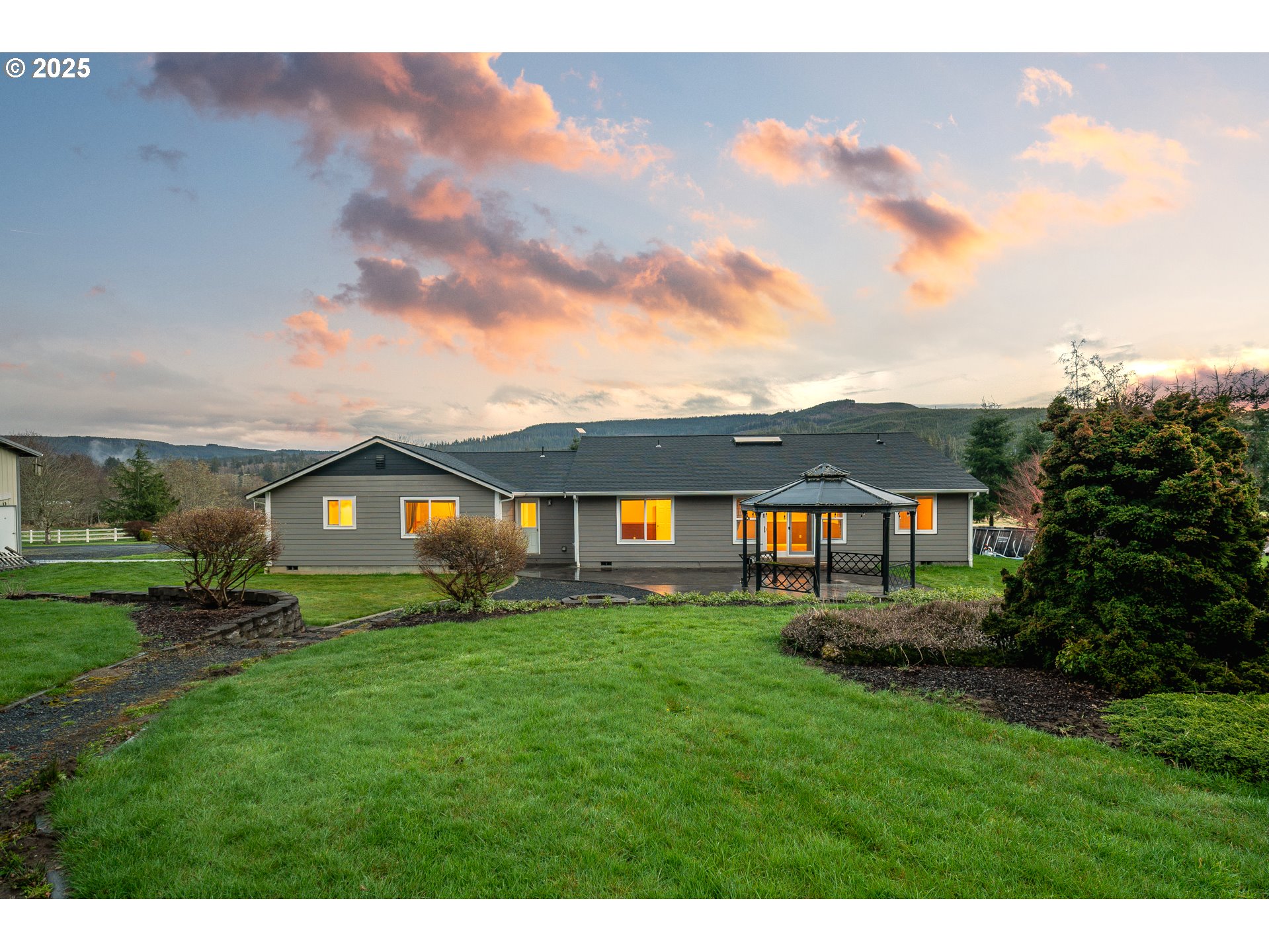23 Elk Ridge Drive Cathlamet, WA 98612 - Photo 43 of 46 a front view of a house with a yard