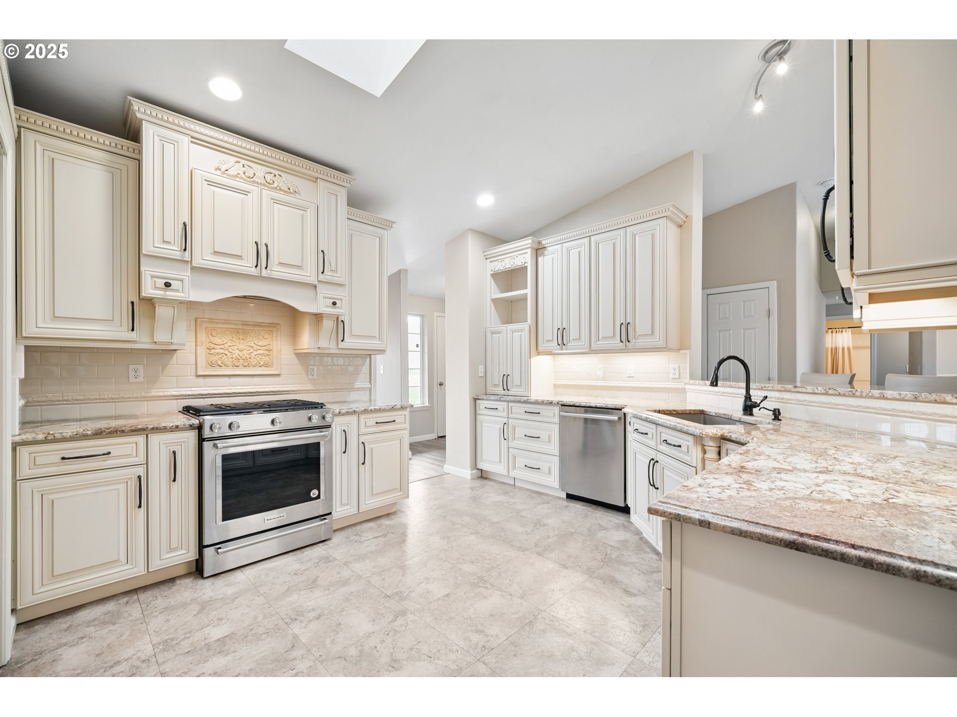 23 Elk Ridge Drive Cathlamet, WA 98612 - Photo 6 of 46 a kitchen with stainless steel appliances granite countertop a stove sink and cabinets