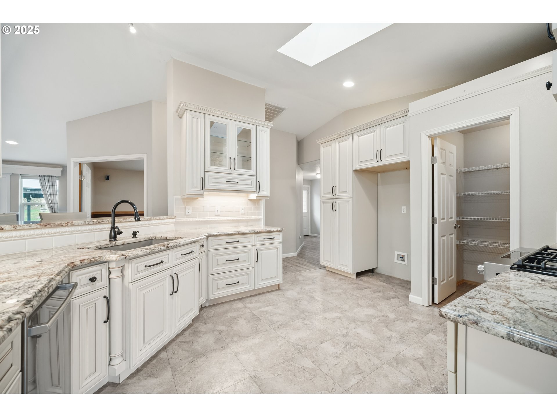 23 Elk Ridge Drive Cathlamet, WA 98612 - Photo 7 of 46 a large bathroom with a granite countertop sink and a mirror
