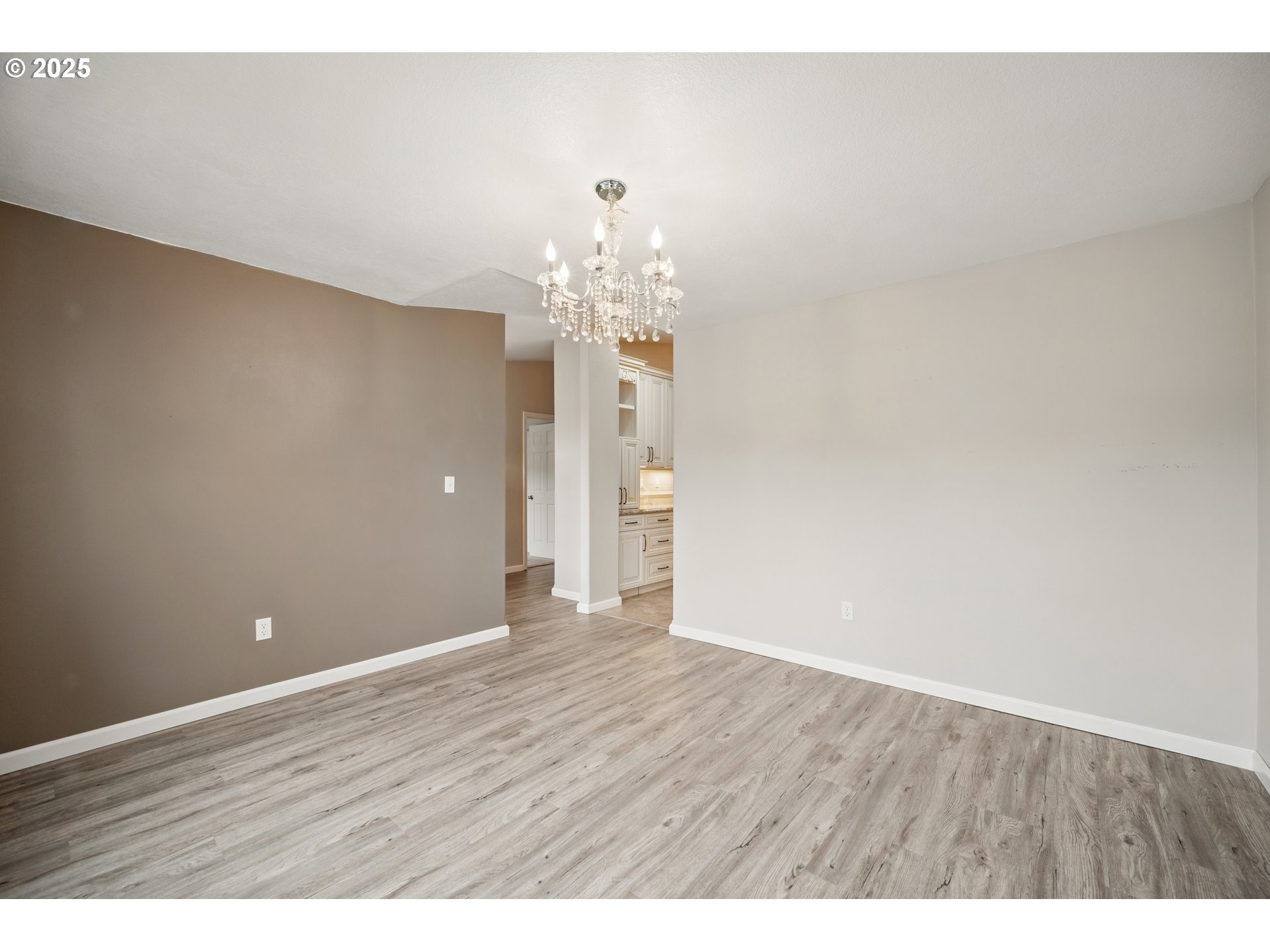 23 Elk Ridge Drive Cathlamet, WA 98612 - Photo 9 of 46 a view of an empty room with wooden floor