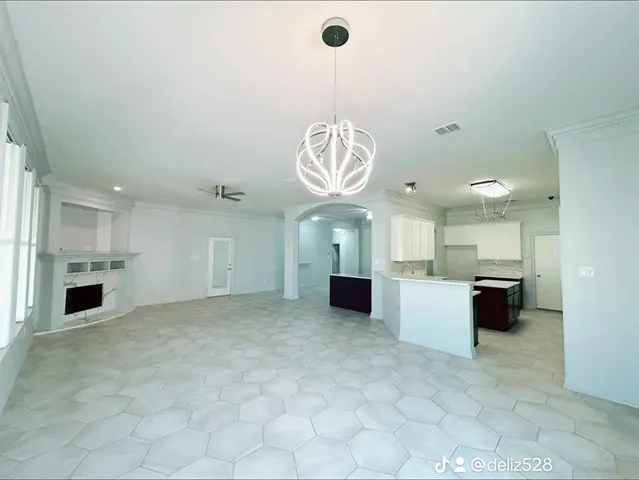 a view of a kitchen with a sink