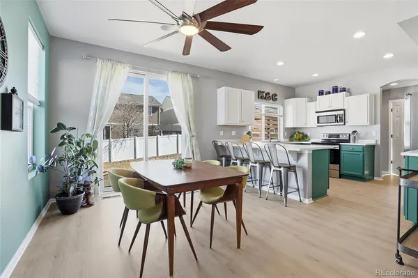 a view of a dining room with furniture and a livingroom