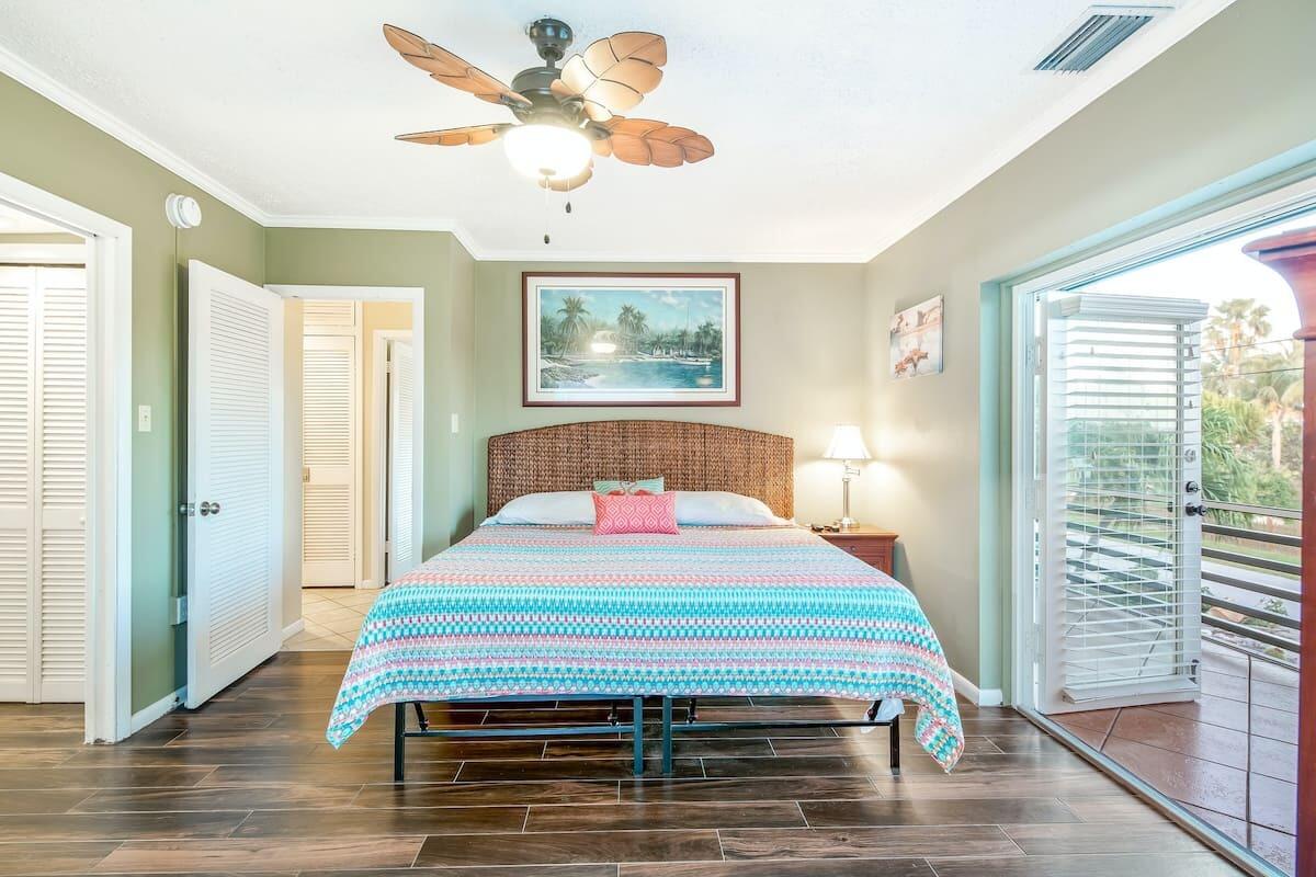 1495 Copa D Oro Marathon, FL 33050 - Photo 18 of 41 a room with a bed and a window