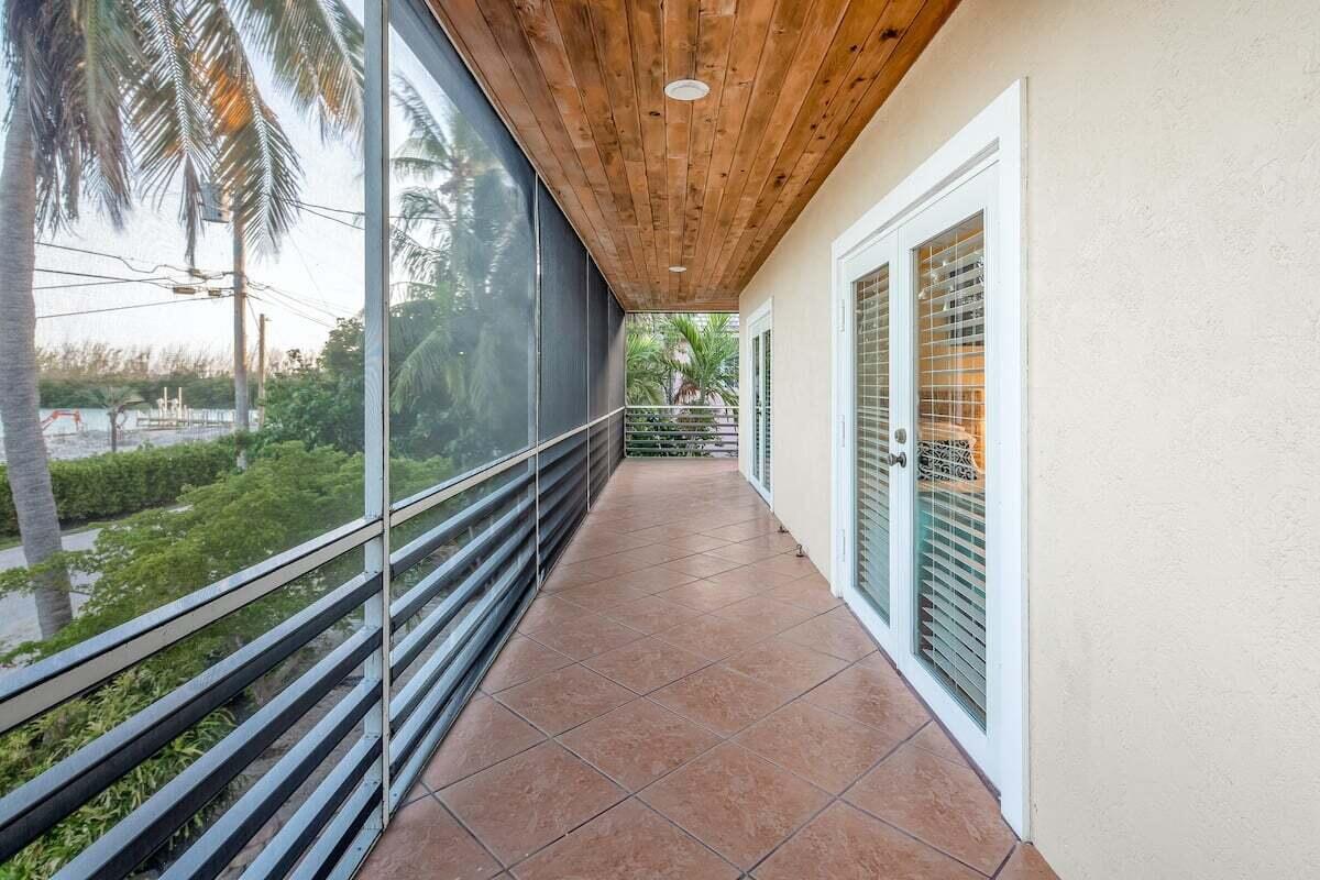 1495 Copa D Oro Marathon, FL 33050 - Photo 19 of 41 a view of a balcony with chairs