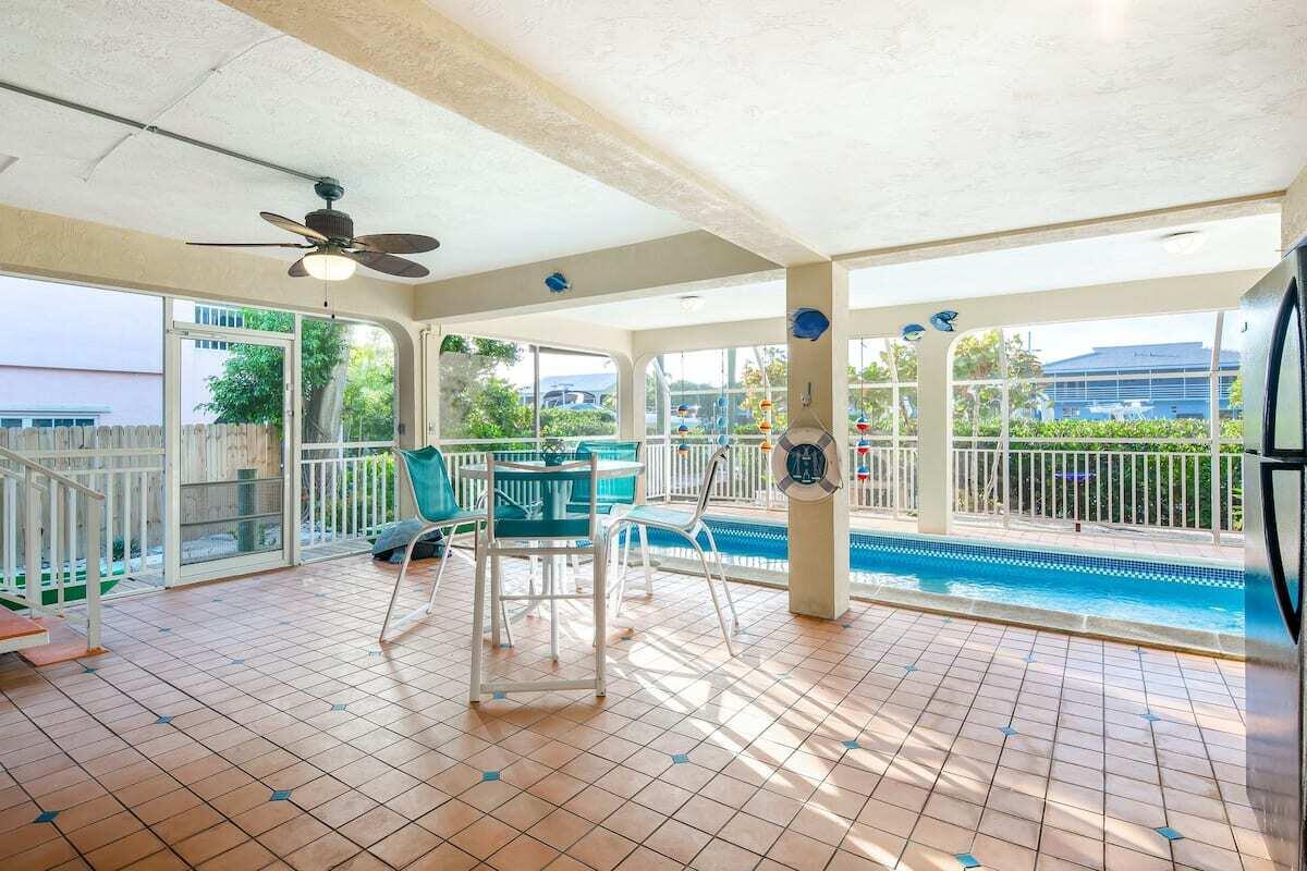 1495 Copa D Oro Marathon, FL 33050 - Photo 30 of 41 a view of a porch with a backyard
