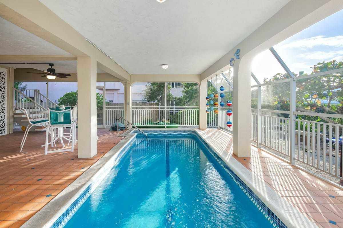 1495 Copa D Oro Marathon, FL 33050 - Photo 37 of 41 wooden floor with a balcony