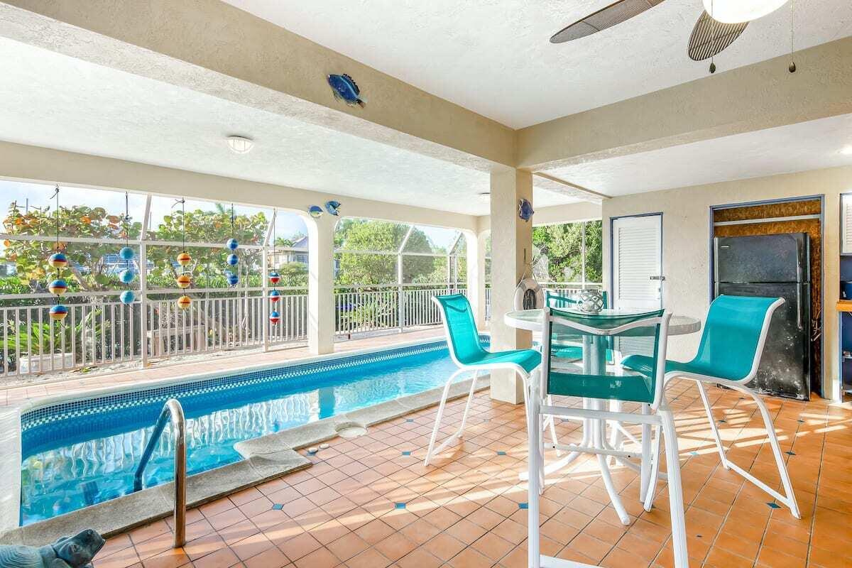 1495 Copa D Oro Marathon, FL 33050 - Photo 38 of 41 a view of a dining room with furniture window and outside view