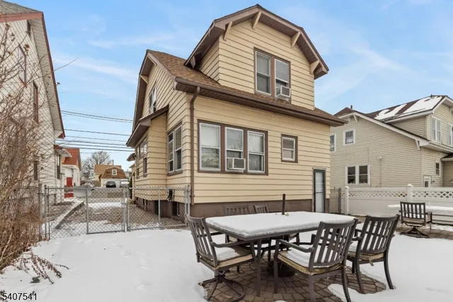 a view of a dinning table and chairs in the patio
