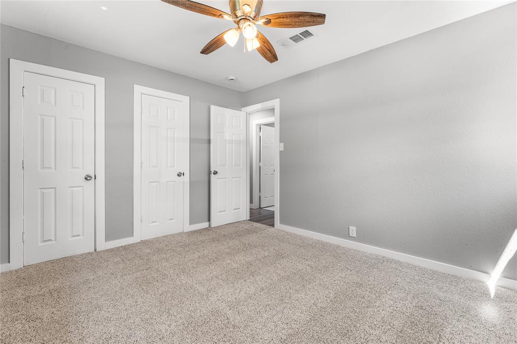 709 North Rita Street Lacy-Lakeview, TX 76705 - Photo 14 of 32 a view of an empty room and chandelier fan