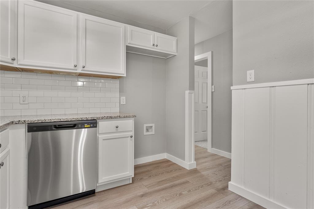 709 North Rita Street Lacy-Lakeview, TX 76705 - Photo 23 of 32 a kitchen with stainless steel appliances granite countertop a refrigerator and a stove